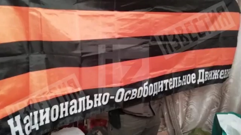 У стрелка Евгения Манюрова при обыске в квартире обнаружили флаг и атрибутику НОД Евгения Фёдорова